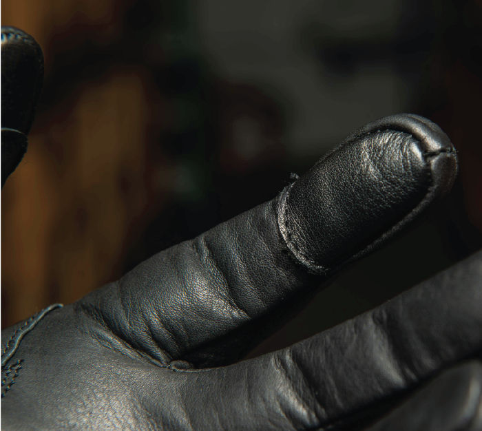 Illustrative example of black leather glove from Google Search