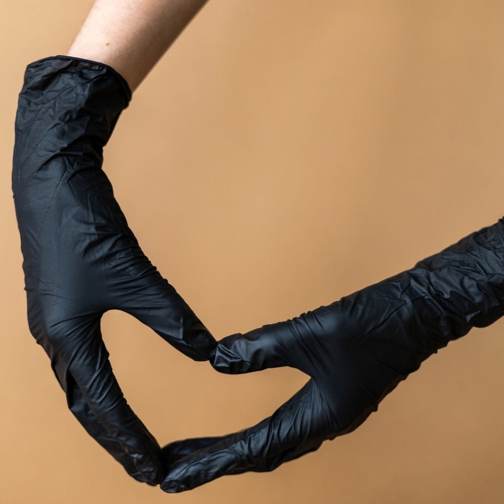 Illustrative example of black work gloves from Google Search