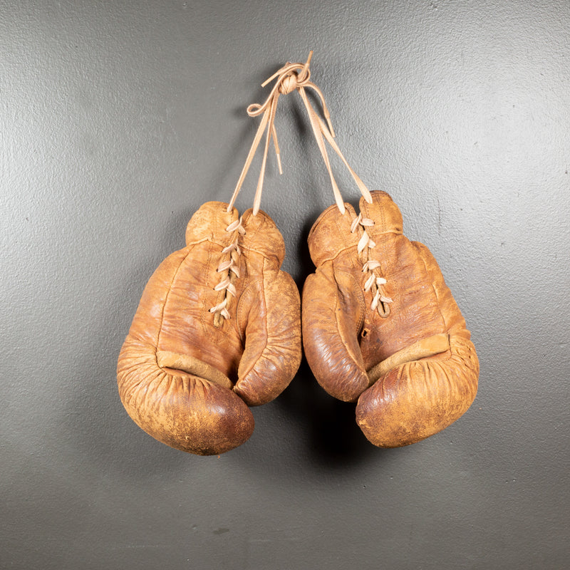 Illustrative example of boxing gloves retro from Google Search