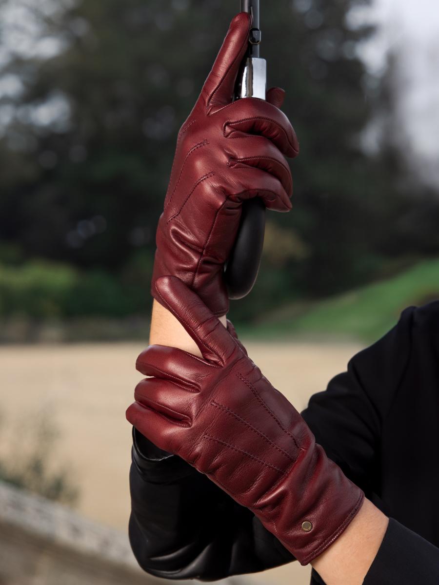 Illustrative example of burgundy leather gloves from Google Search