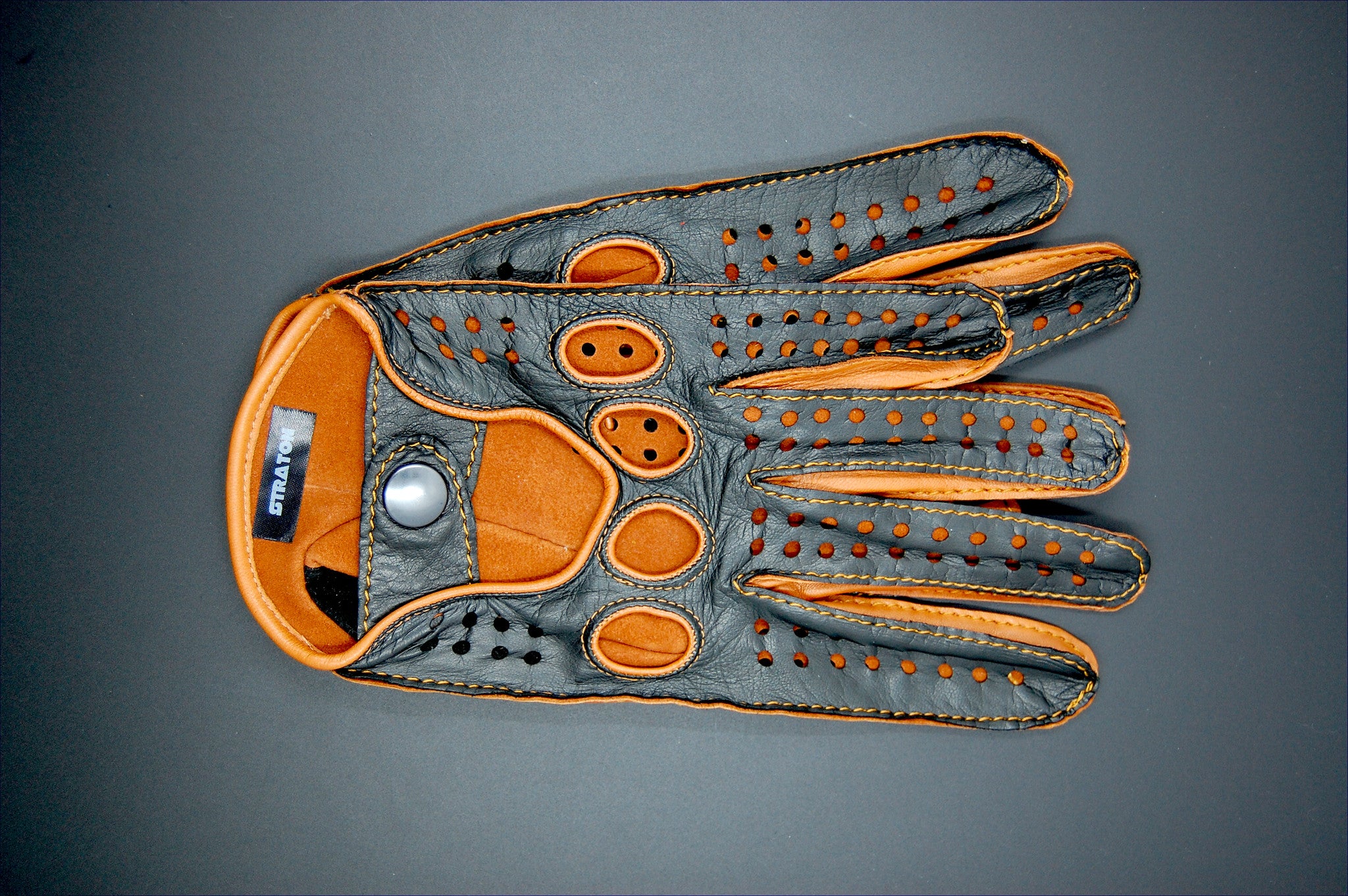 Illustrative example of gloves driving leather from Google Search