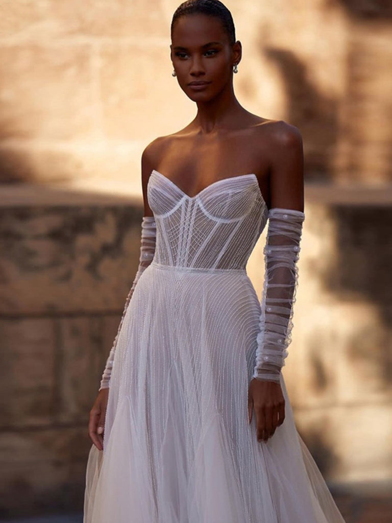 Illustrative example of wedding gown with gloves from Google Search