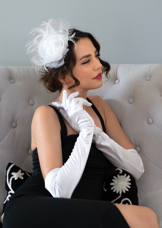 Illustrative example of white satin gloves from Google Search